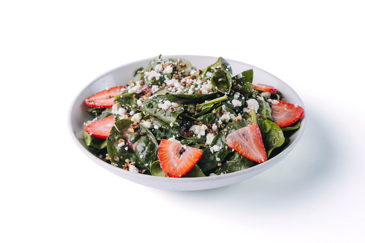 Image of a strawberry salad on a bowl