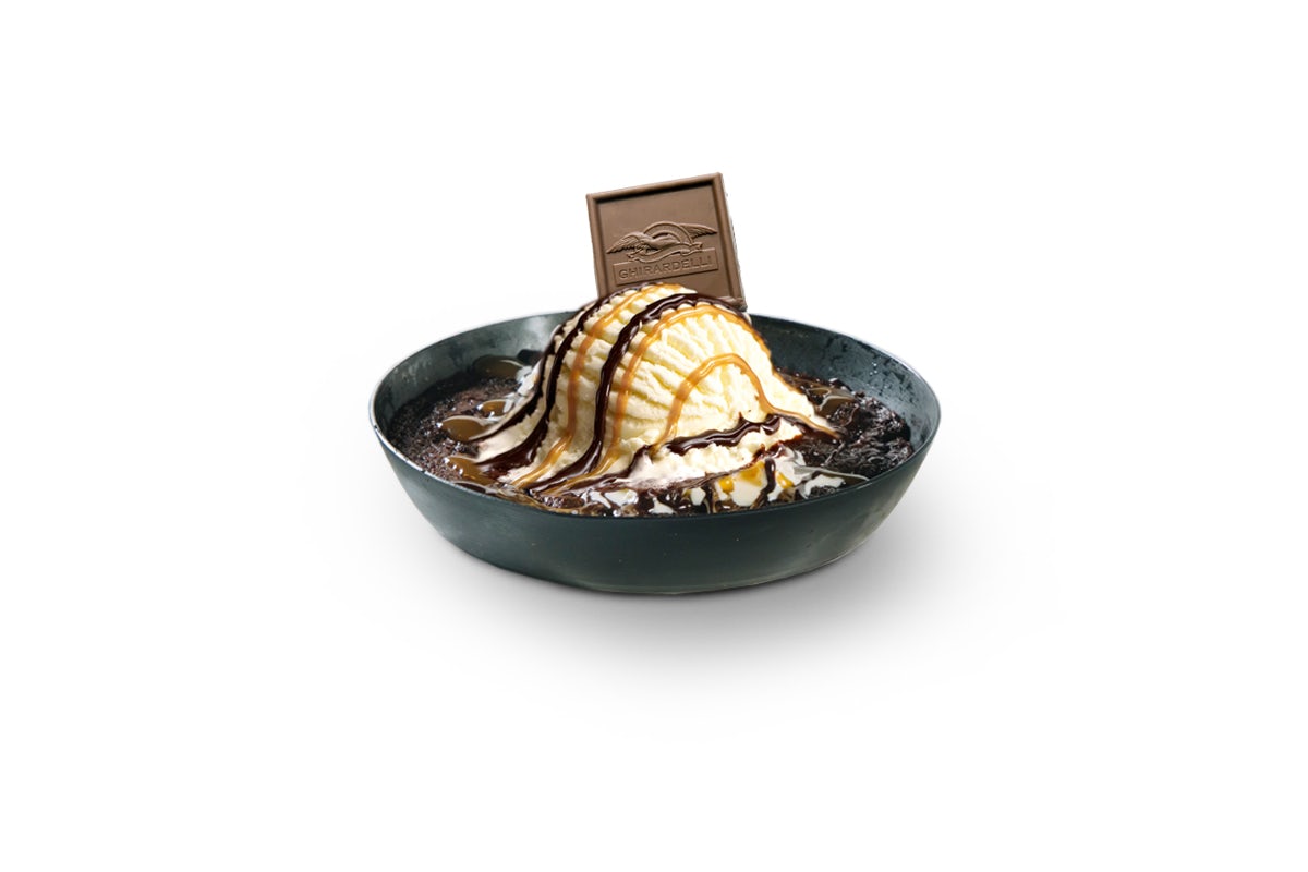 photo of our chocolate brownie addiction with Ghirardelli® Milk Chocolate Caramel Square on top