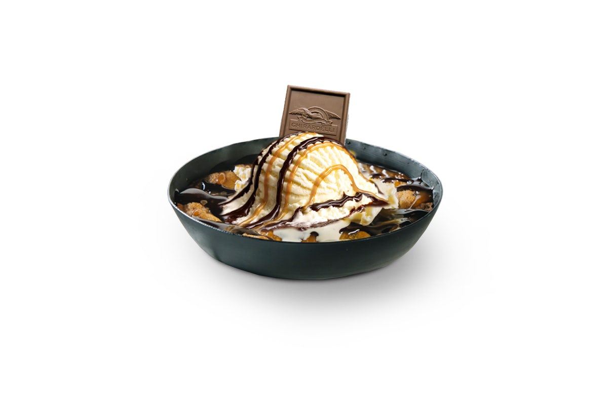 photo of our monster cookie with Ghirardelli® Milk Chocolate Caramel Square on top