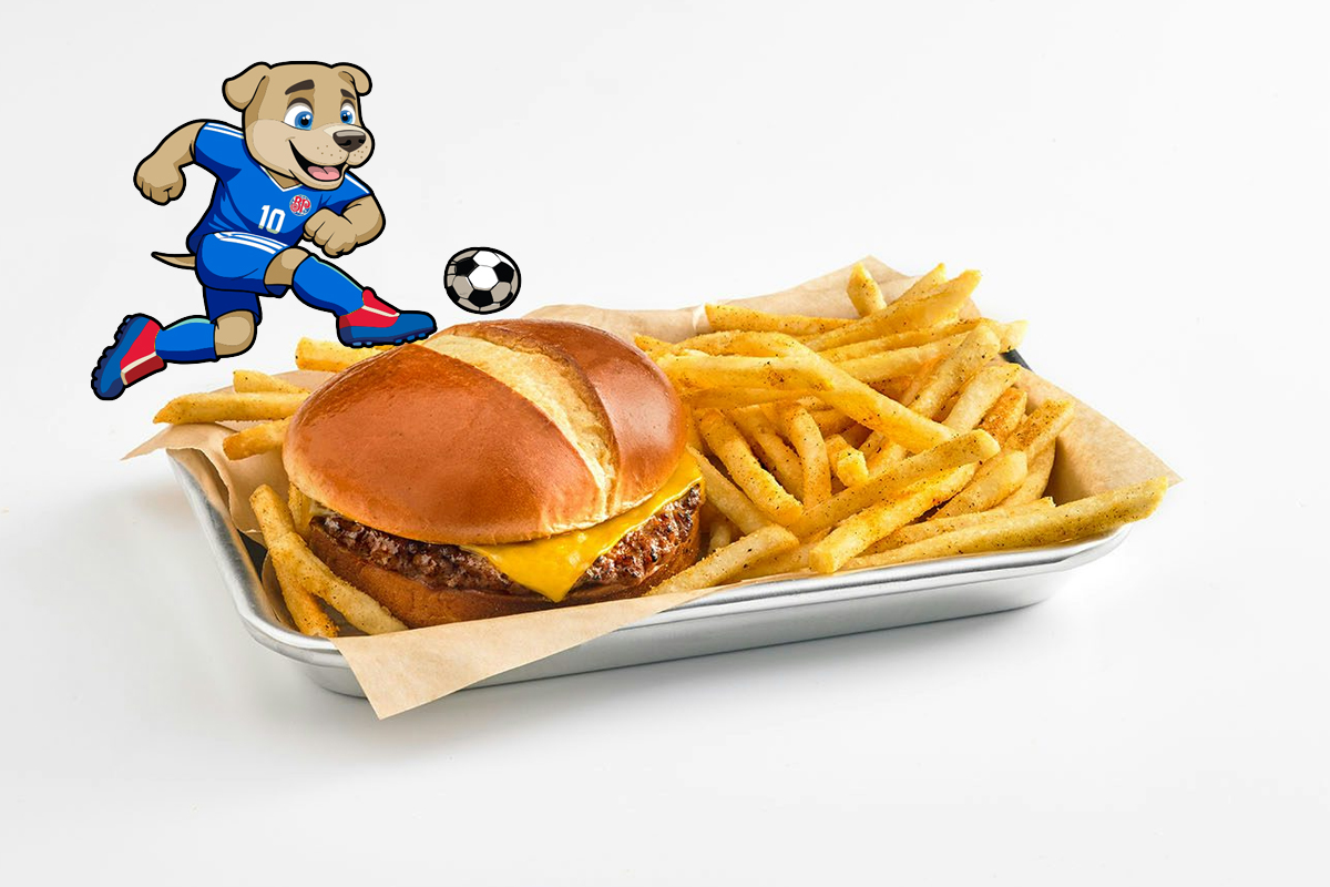 Image of a burger with fries on a tray. 