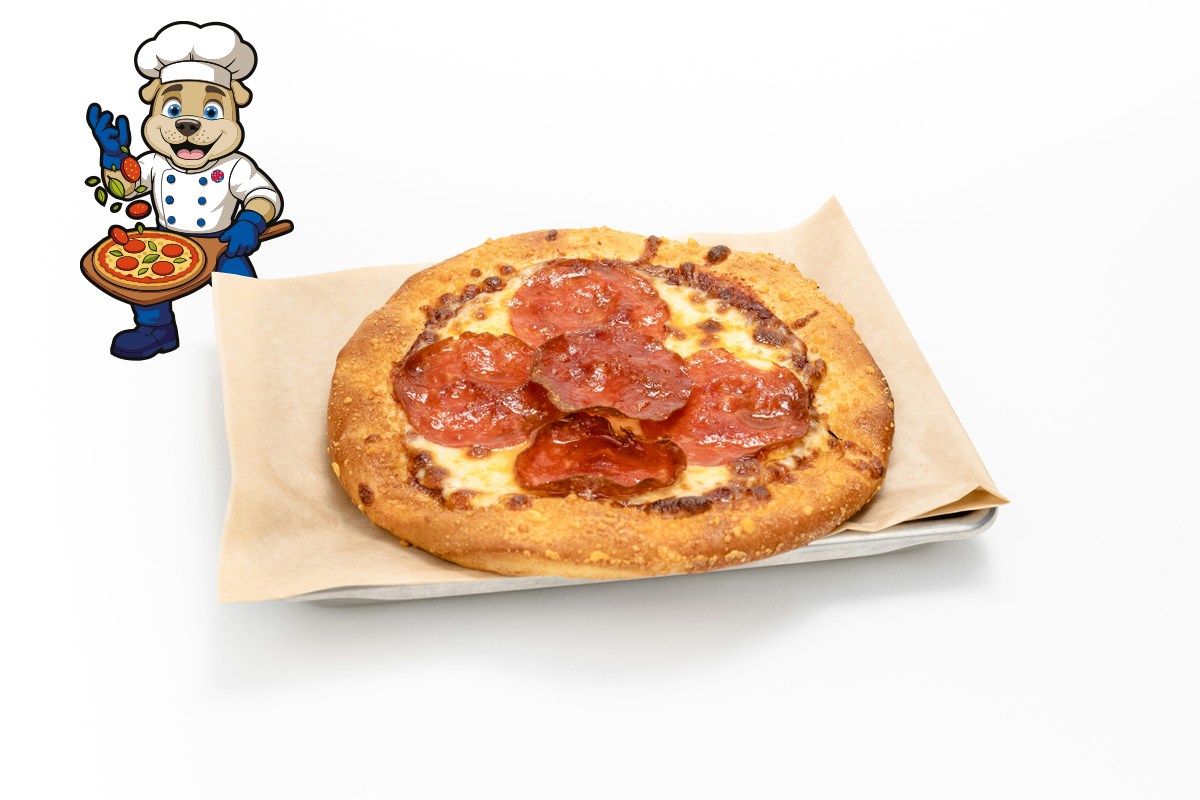 Image of kid's pepperoni pizza on a sheet pan and brown parchment paper with our mascot beside it.