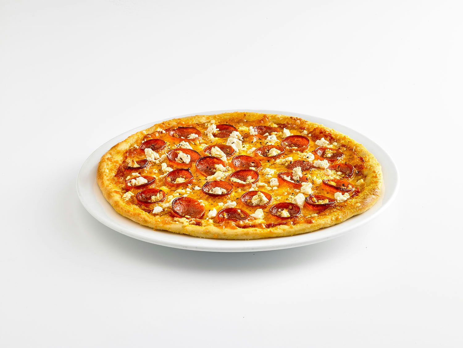 image of a thin crust Pepperoni and Feta pizza.