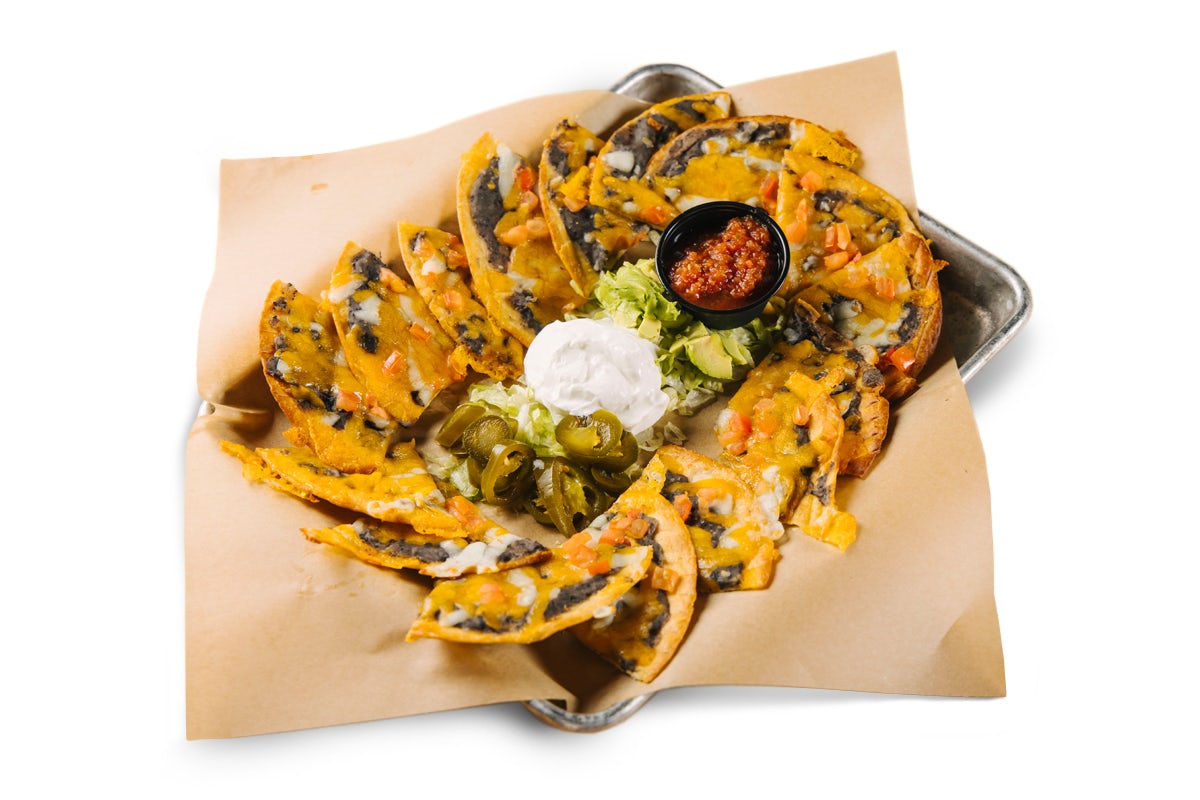 photo of boston's nacho on a sheet pan