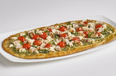 The Spicy Chicken Pesto flatbread on a long plate.