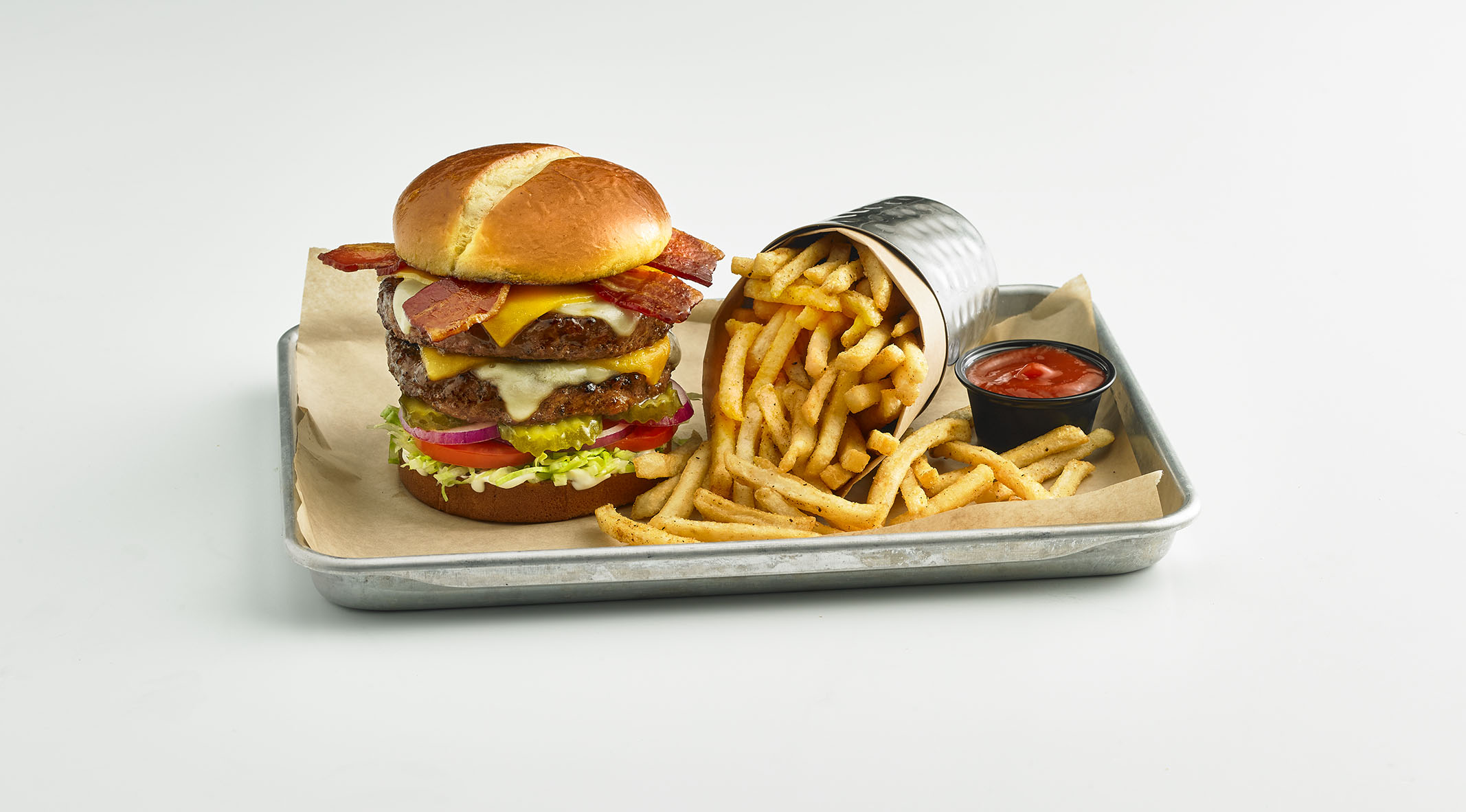 Image of a burger with two patties and extra cheese.