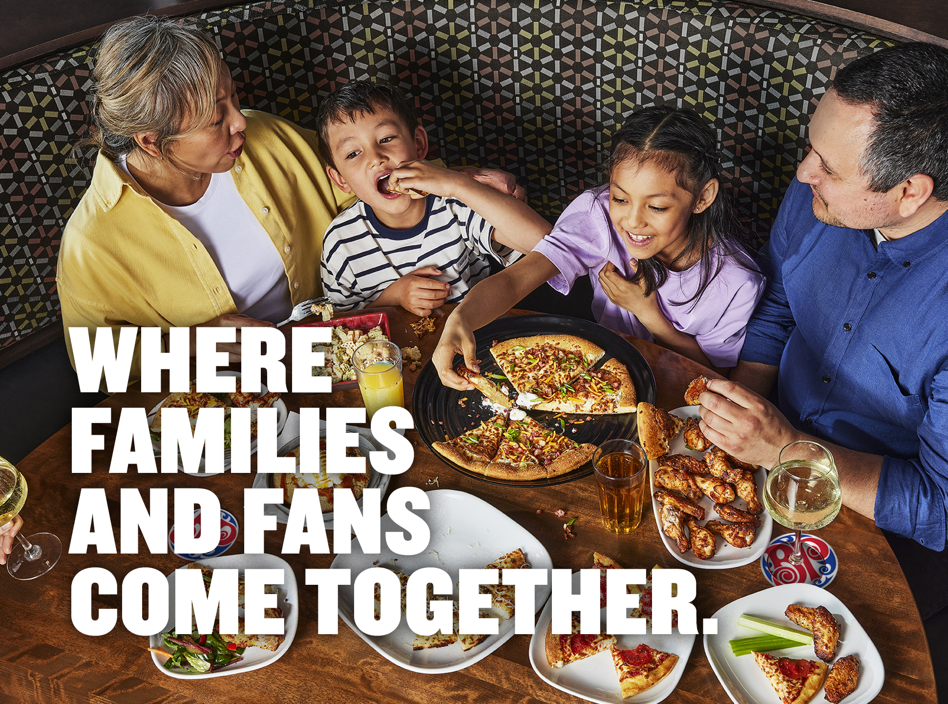 image of a family enjoying a boston's pizza meal