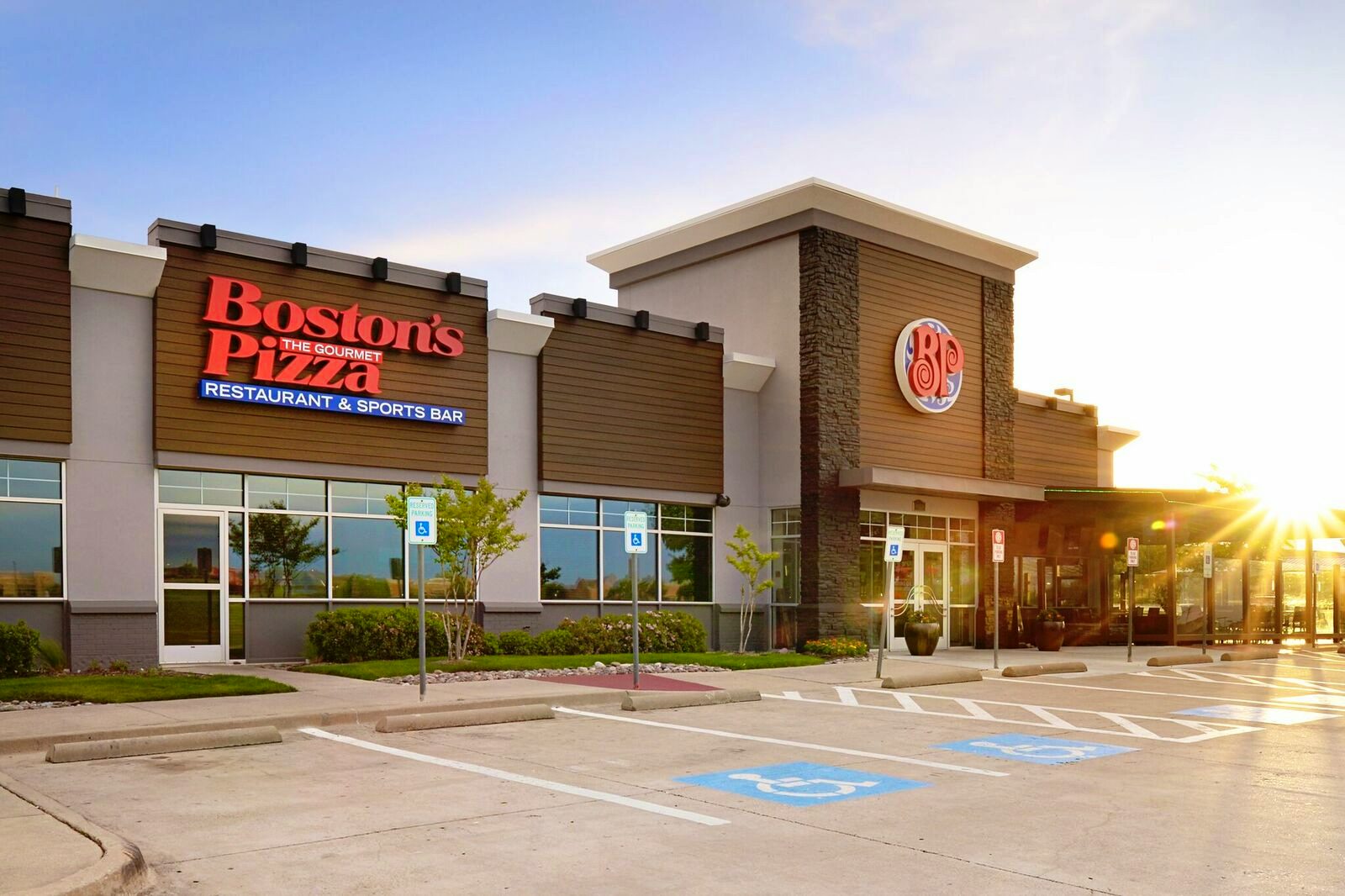 exterior photo of the building with Boston's logo.